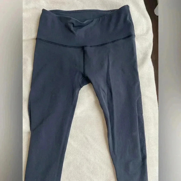 Lululemon set of cropped leggings with mesh on side 
Sz small navy blue & black - Picture 2 of 16